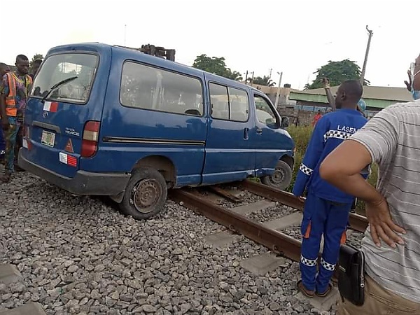 Two Injured In Car-train Crash As Reckless Driver Tried To Beat Speeding Train In Lagos - autojosh 