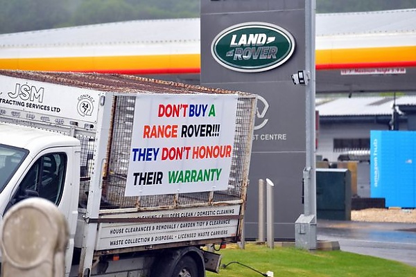 Range Rover Owner Blocks Dealership With Vehicles Plastered With Angry Messages Over Recurring Issues - autojosh 