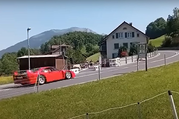 A $2.5million Ferrari F40 crashes into a barrier during a classic car event to mark the brand's 75th anniversary 