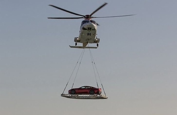 Aston Martin Vanquish Airlifted 1,000-feet Onto The Helipad At Dubai Hotel - autojosh 