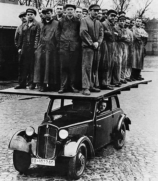 Today's Photos : Audi Workers Demonstrating The Body Strength Of The Audi 920 In 1938 - autojosh 