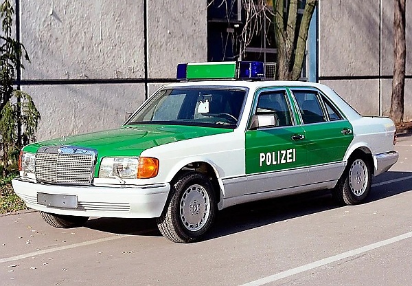 Armored Mercedes Police Car Used As Escort To Transport Money To Bank Has Doors Fitted With Guns - autojosh 