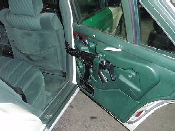 Armored Mercedes Police Car Used As Escort To Transport Money To Bank Has Doors Fitted With Guns - autojosh 