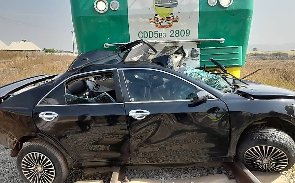 Female Driver Dies After Train Rams Into Her Car That Got Stuck On Rail Track In Abuja - autojosh 