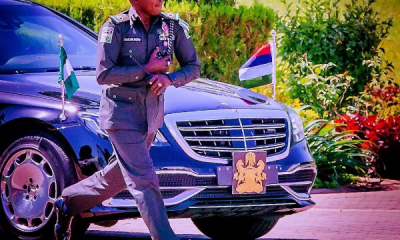 Today's Photo : Security Aid Jogging Alongside Buhari's Bulletproof Mercedes-Maybach S560 - autojosh