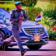 Today's Photo : Security Aid Jogging Alongside Buhari's Bulletproof Mercedes-Maybach S560 - autojosh