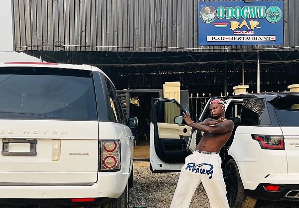 Singer Portable Shows Off His All-white Range Rover And Range Rover Sport SUVs - autojosh