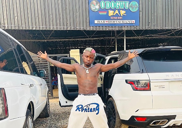 Singer Portable Shows Off His All-white Range Rover And Range Rover Sport SUVs - autojosh
