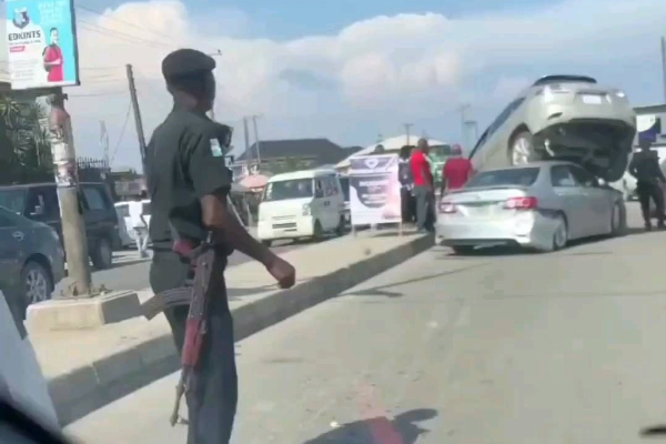 Watch : Lexus RX Climbs Toyota Corolla In Ajah After A Female Driver Mistakenly Reverses Her SUV - autojosh 