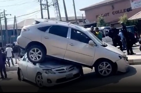 Watch : Lexus RX Climbs Toyota Corolla In Ajah After A Female Driver Mistakenly Reverses Her SUV - autojosh 