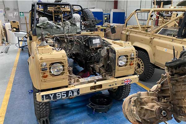 British Army Set To Convert Old Land Rover Defenders From Diesel To EV