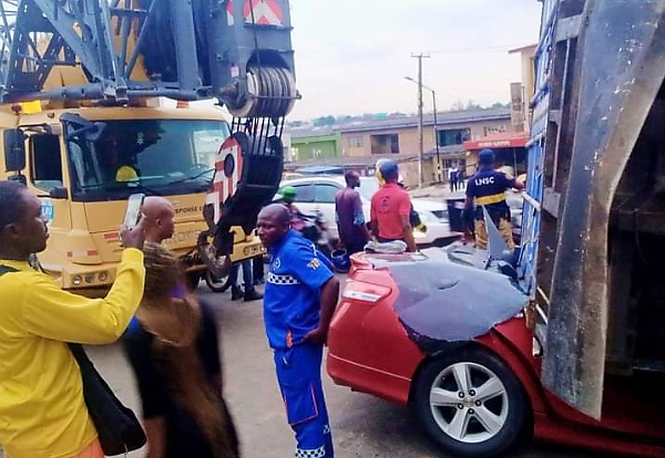 No Casualty As 20ft Container Crushes Toyota Camry In Lagos - autojosh 