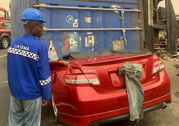 No Casualty As 20ft Container Crushes Toyota Camry In Lagos - autojosh 