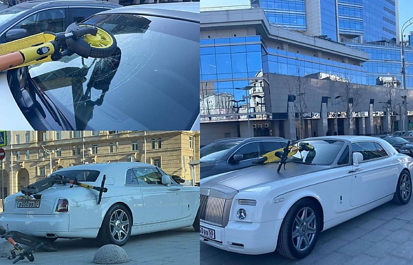 Today's Photos : Angry Protesters Smashed Scooters On Rolls-Royce Phantom In Russia - autojosh