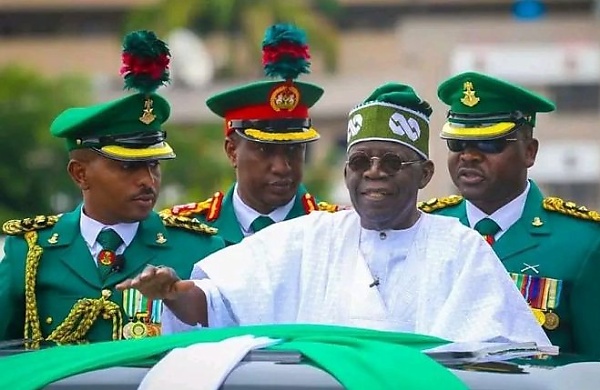 President Tinubu Rides In Mercedes G-Class Parade Car To Inspect The Guard Of Honour - autojosh 