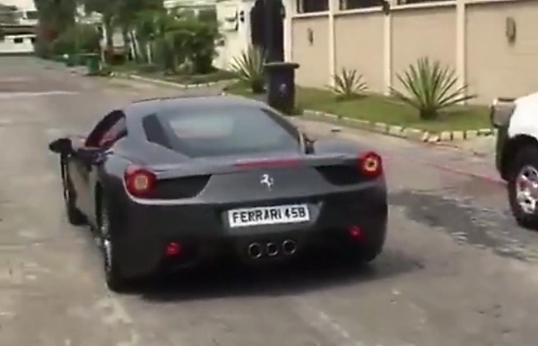 Watch As Nigerian Billionaire Struggle To Drive His Ferrari Through Makeshift Wooden Ramp - autojosh 