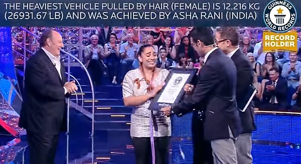 Heaviest Vehicle Pulled By Hair (Female), A Double Decker Bus With 32 People On Board By Asha Rani - autojosh 