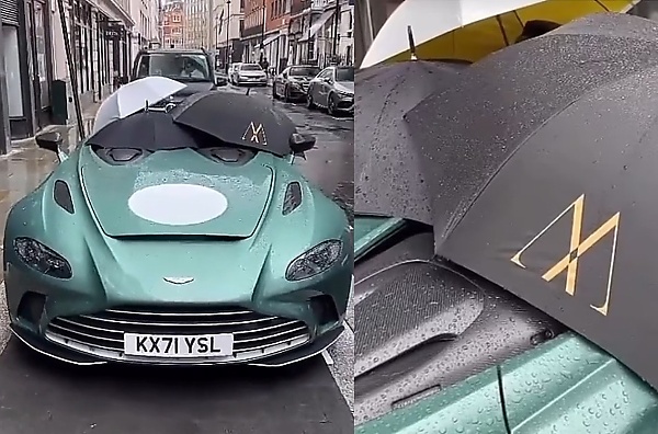 Rain Forces Owner To Use Three Umbrellas To Cover The Interior Of Roofless $1Million Aston Martin - autojosh