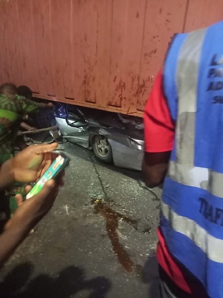 LASEMA, LASTMA Rescue Three Adults As Container Crushes Toyota Corolla At Ojuelegba - autojosh 