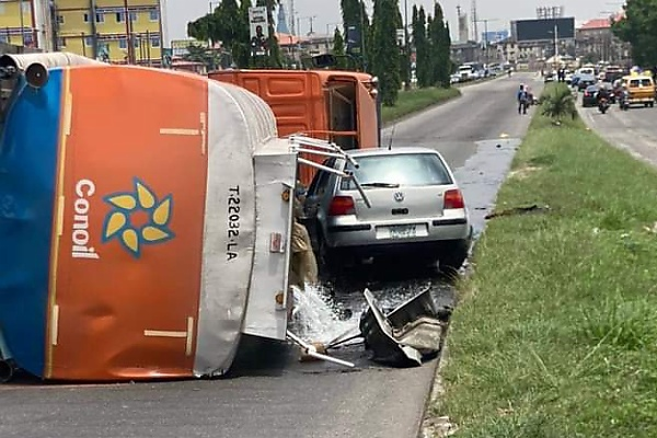 LASTMA Averts Explosions At Surulere As Loaded Tanker Topples On VW Golf, Driver Arrested - autojosh 