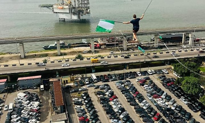 Guinness World Records Holder Walks On Rope Across Lagos Train Tracks, Bridges To Take Selfie (PHOTOS) - autojosh