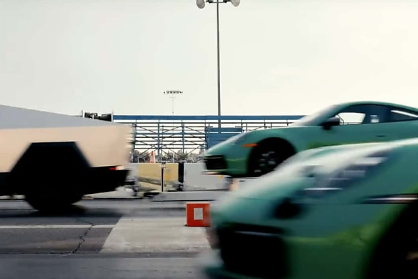 Watch A $100k Tesla Cyberbeast Outrun a Porsche 911 In A Drag Race - While Towing A 911 - autojosh 