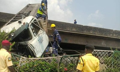 Articulated Truck Falls Off Lagos Bridge While Struggling A 'Right of Way' With Another Truck - autojosh