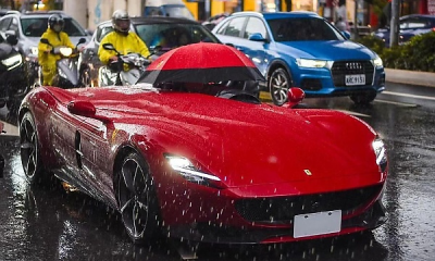 Owner Of Roofless Ferrari Monza SP1 Worth N5 Billion Forced To Use Umbrella During Heavy Rain - autojosh