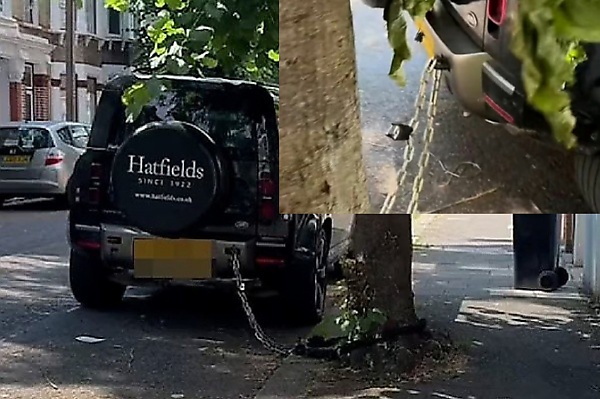 Land Rover Owner Chained Defender SUV To A Tree In London To Prevent Thieves From Stealing It - autojosh