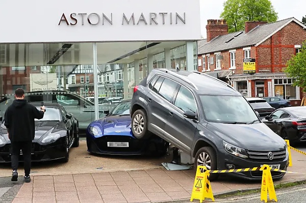 VW Driver Reverses £10,000 Tiguan Over A £210,000 Aston Martin DBS Supercar At A Dealership - autojosh