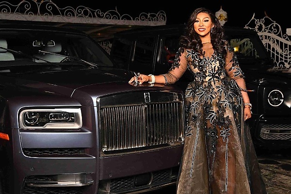 Interior Designer 'Eva Ogbebor' Gift Herself Rolls-Royce Cullinan, Displays It On Stage During Birthday Bash - autojosh 