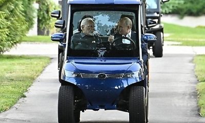 Russian President Vladimir Putin Drives Indian PM Modi Around In Electric Golf Cart - autojosh