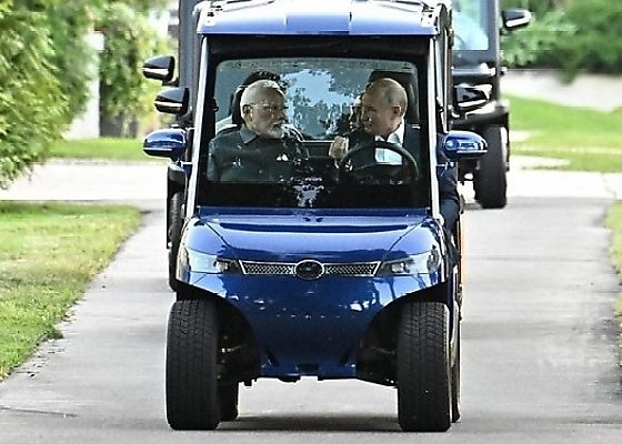 Russian President Vladimir Putin Drives Indian PM Modi Around In Electric Golf Cart - autojosh