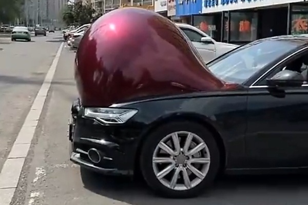 Extreme Hot Weather Left Many Wrapped Cars Looking Pregnant In China - autojosh 