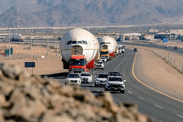 Dozens Of Saudi Police Cars Escort Trucks Carrying Three Retired Aircrafts From Jeddah To Riyadh - autojosh 