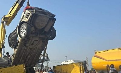 Driver Miraculously Rescued Alive As 40ft Container Falls On Toyota Camry At Mile 2 - autojosh