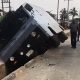 Photo : Nigerian Police Bullion Van Falls Into Gutter In Lagos Due To Steering Problem - autojosh