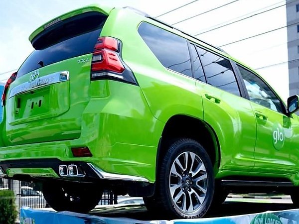 Lagos Deputy Governor Presents Toyota Prado SUV To Lucky Winner At Glo Festival of Joy - autojosh 