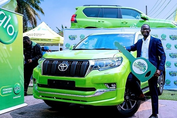 Lagos Deputy Governor Presents Toyota Prado SUV To Lucky Winner At Glo Festival of Joy - autojosh 