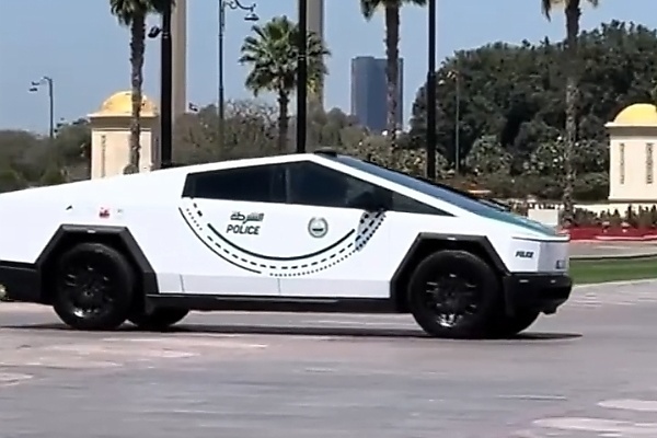 AC Milan Team Bus Escorted By Dubai Police Tesla Cybertruck And G63-based ‘Mansory P720’ - autojosh 