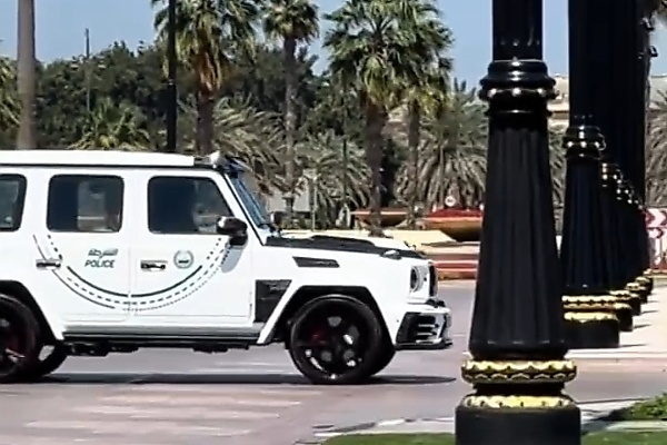 AC Milan Team Bus Escorted By Dubai Police Tesla Cybertruck And G63-based ‘Mansory P720’ - autojosh 