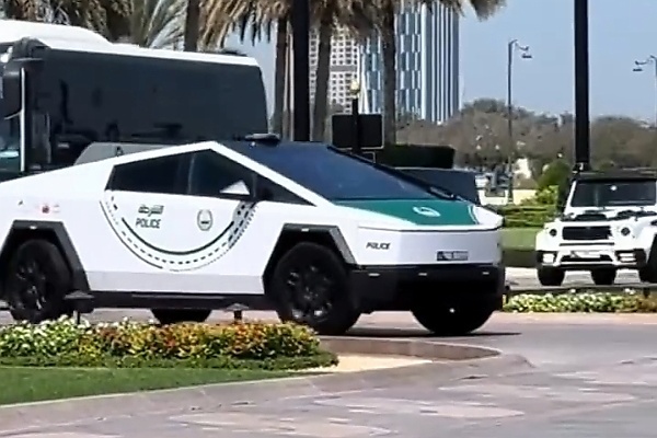 AC Milan Team Bus Escorted By Dubai Police Tesla Cybertruck And G63-based ‘Mansory P720’ - autojosh 