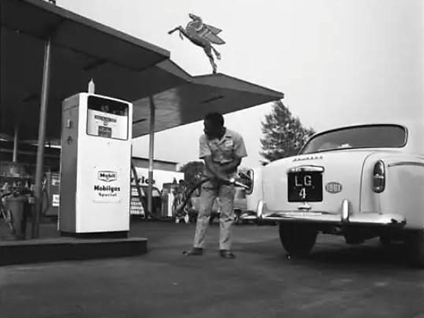 Peugeot 403 Being Refueled At A Gas Station In Lagos In 1961 - It Has Fuel Cap Hidden Inside The Rear Tail Light - autojosh 
