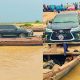 Watch : Canoe Seen Transporting Vehicles In The Convoy Of Nigeria’s First Class Chief Across A River - autojosh