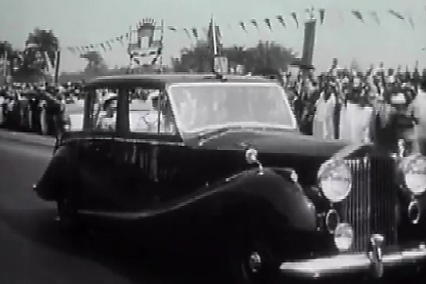 Throwback To 1956 : Royal Guard Chauffeur Stands In Front Of Queen Elizabeth’s Rolls-Royce During Her Trip To Lagos - autojosh 