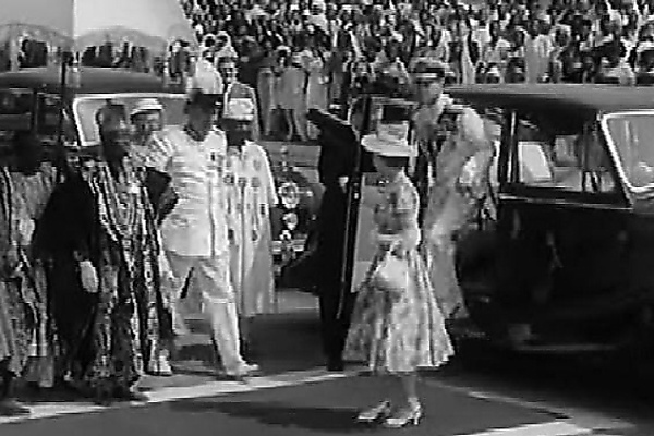 Throwback To 1956 : Royal Guard Chauffeur Stands In Front Of Queen Elizabeth’s Rolls-Royce During Her Trip To Lagos - autojosh 