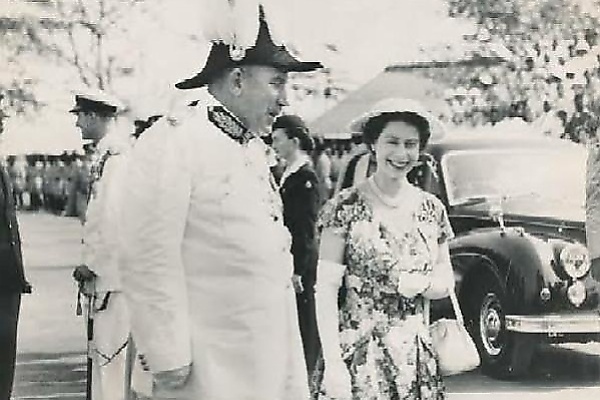 Throwback To 1956 : Royal Guard Chauffeur Stands In Front Of Queen Elizabeth’s Rolls-Royce During Her Trip To Lagos - autojosh 