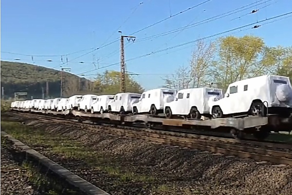 Watch As Dozens Of Mercedes G-Class SUVs In White Protective Covers Get Transported By Train - autojosh 
