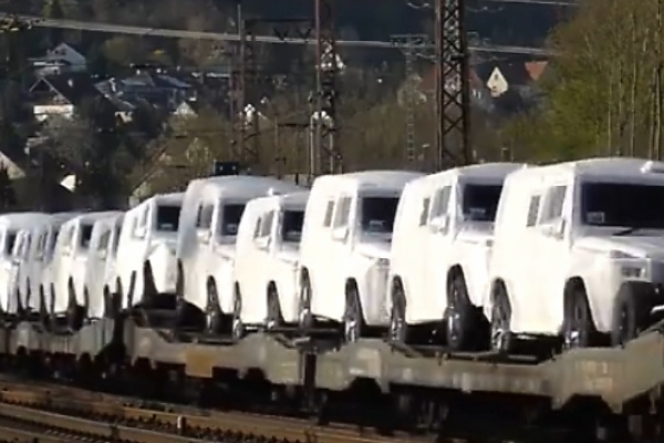 Watch As Dozens Of Mercedes G-Class SUVs In White Protective Covers Get Transported By Train - autojosh 