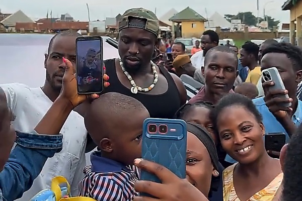 VeryDarkMan Pulls A Large Crowd After Turning Up At A Ghetto In Abuja In Tesla Cybertruck - autojosh